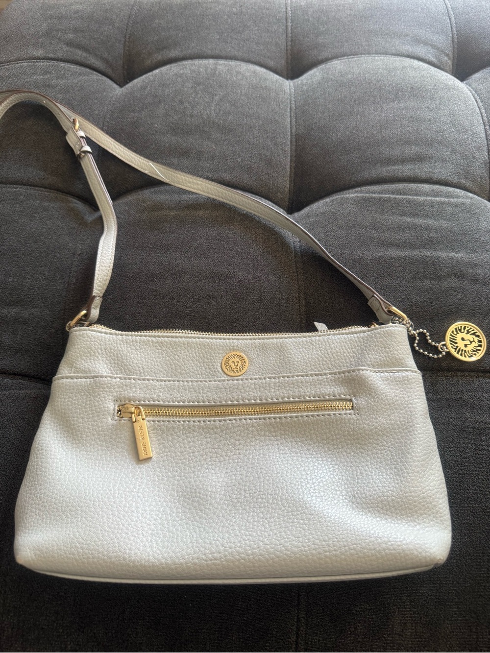 Anne Klein Light Gray faux Leather Crossbody Bag with Gold Accents